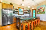 Fully Equipped Kitchen Features Stainless Steel Appliances and Ample Counter Space